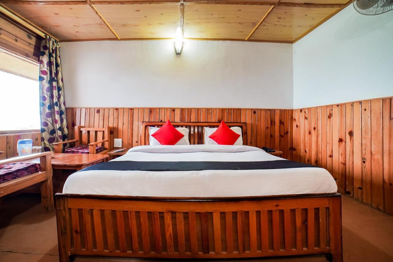 Capital O 47240 Hotel Blossom Resort Kausani Esterno foto